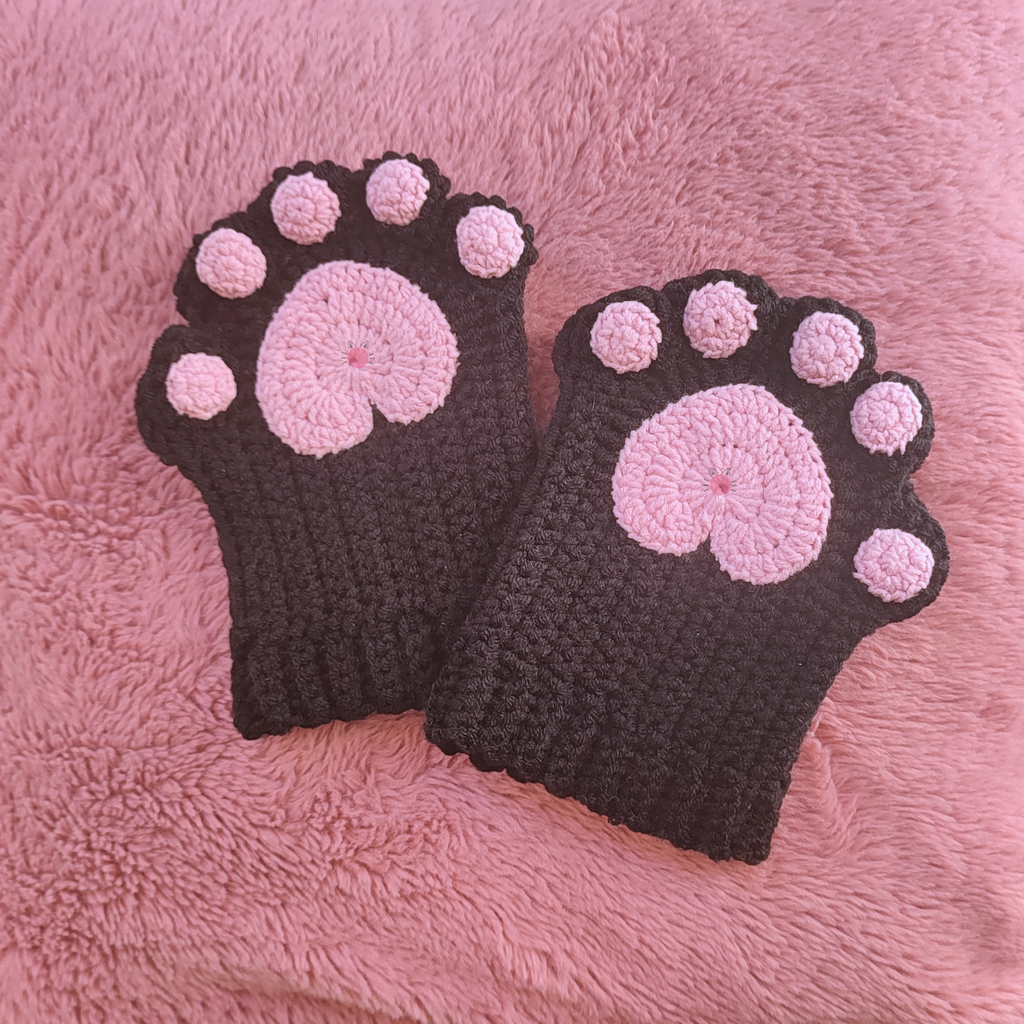 Crocheted paw-shaped mittens cozy and warm for winter 