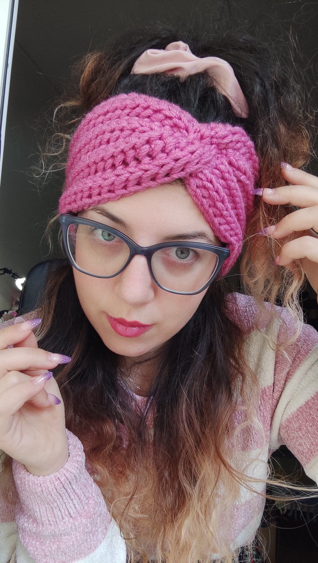 handmade chunky crochet headband worn by woman