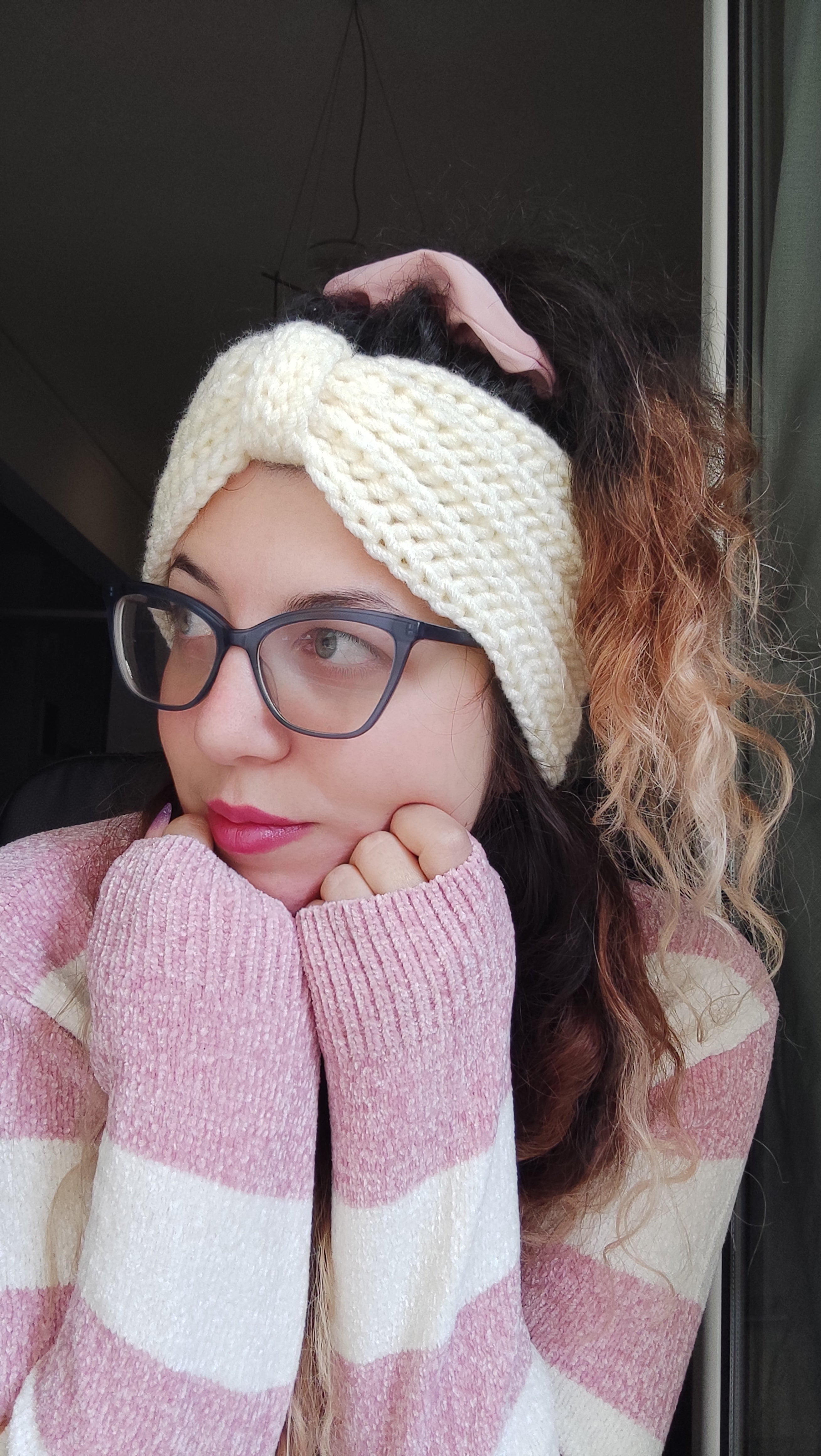 handmade chunky crochet headband worn by woman