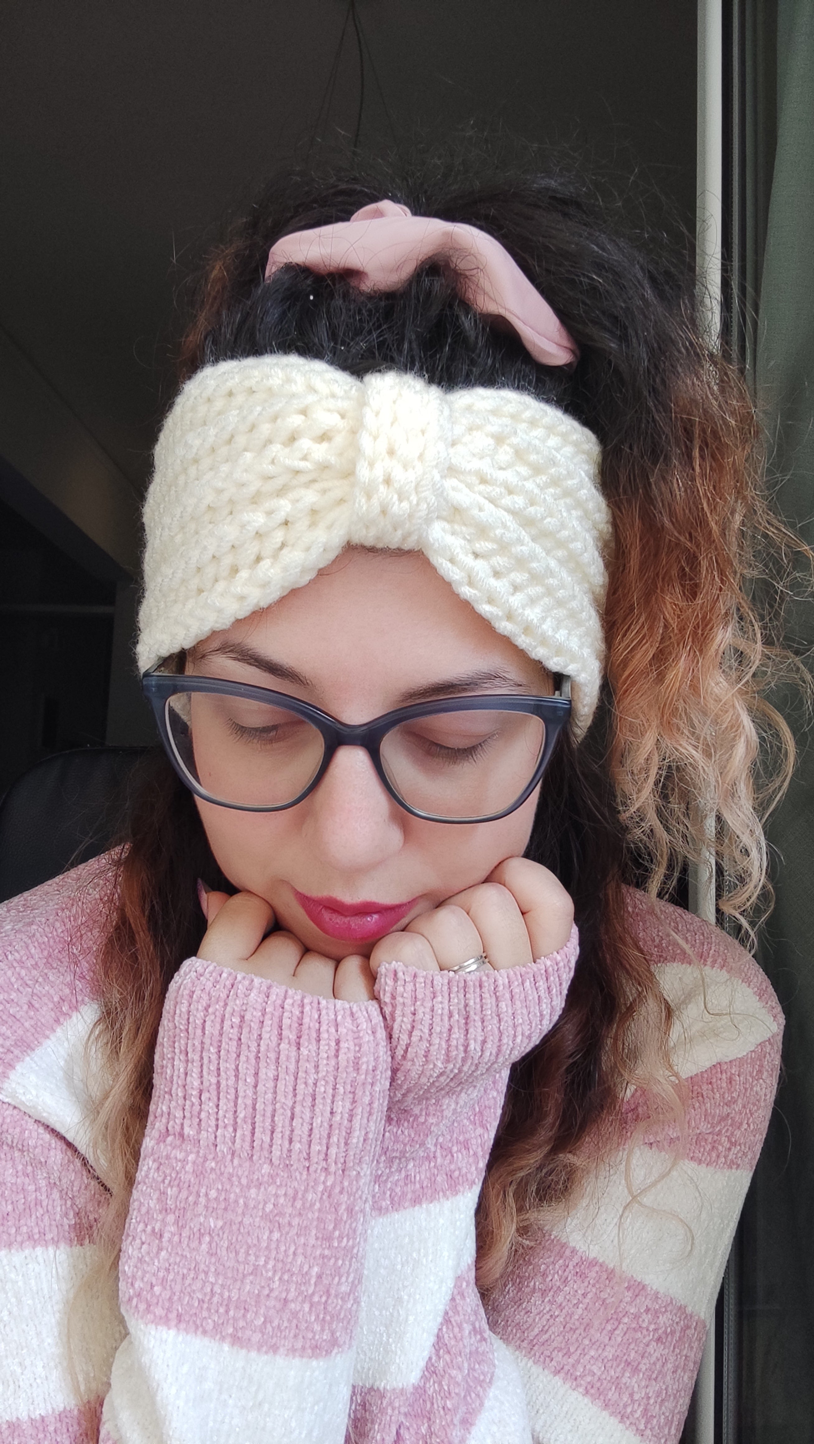 handmade chunky crochet headband worn by woman