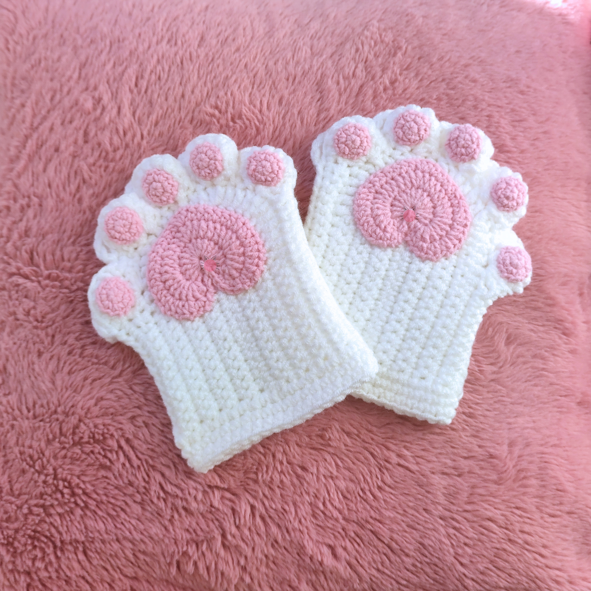 Pair of white and pink crochet cat mittens cute winter accessory 